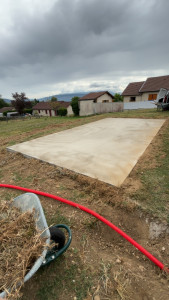 Photo de galerie - Réalisation d’une dalle béton armée pour piscine hors-sol