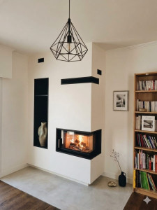 Photo de galerie - Réalisation et pose d'une Cheminées et conduits avec son habillage plaque de plâtre avec c'est aérations et ses niche en acier (peint en noir émaillé)