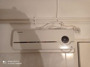 Photo de galerie - Installation d'un chauffage d'appoint dans une salle de bain.