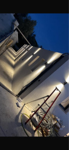 Photo de galerie - Installation d’applique extérieur noir double flux blanc froid 