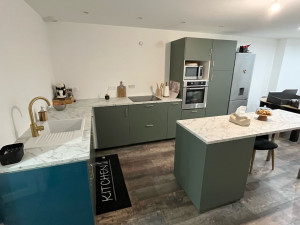 Photo de galerie - Cuisine avec ilot en L