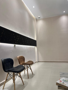 Photo de galerie - Salle d’attente d’un cabinet dentaire 