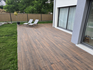 Photo de galerie - Pose de lame composite pour une terasse ( 50m2 )

