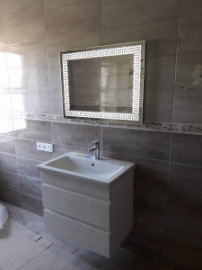 Photo de galerie -     Pose du carrelage dans la salle de bains