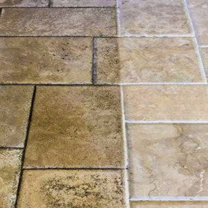 Photo de galerie - Illustration d'un nettoyage vapeur haute température sur carrelage.