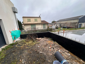 Photo de galerie - Extension d’un plancher les murs en bloc a bancher contre la terre pour solidité 
