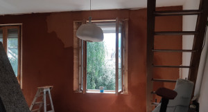 Photo de galerie - Réalisation d'un enduit terre