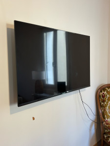 Photo de galerie - Fixation support TV + pose TV