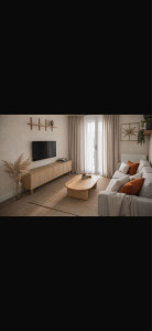 Photo de galerie - Réaménagement d’un salon et optimisation de l’espace.