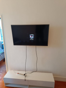 Photo de galerie - Fixation d'une TV au mûr 