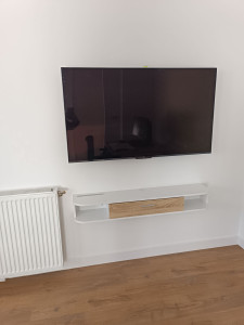 Photo de galerie - Pose d'une tv au mur et meuble 