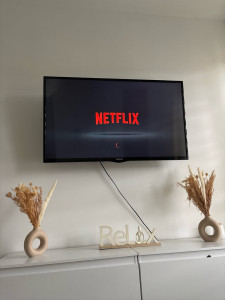 Photo de galerie - Montage de support télé murale