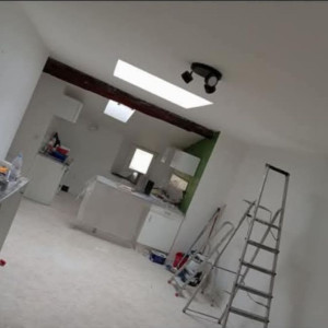 Photo de galerie - Rénovation complète d'un appartement pose de cuisine et revêtement de sol