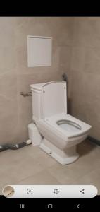 Photo de galerie - Pose de toilettes avec sanibroyeur