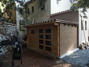 Photo de galerie - Brigniles de jardin + dalle + double toiture par muraliere. 