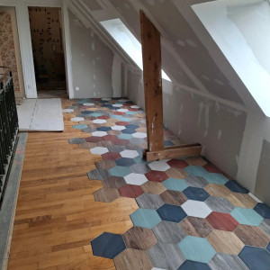 Photo de galerie - Palier avec insertion octogone dans parquet existant. 