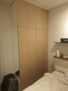 Photo de galerie - Réalisation des portes de dressing pour relooker la façade du dressing 