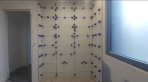 Photo de galerie - Carrelage sale de bain. 