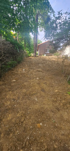 Photo de galerie - Talutage de déblais en pente naturelle. 