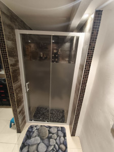Photo de galerie - Pose porte douche italienne