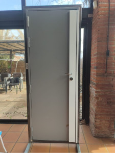 Photo de galerie - Installation de blindage + serrure carénée.