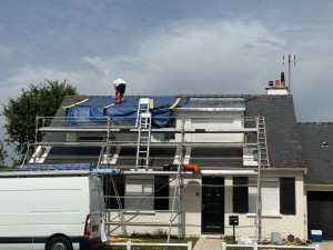 Photo de galerie - Réalisation d’une couverture zinc joint debout