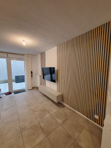 Photo de galerie - Pose de tasseau feutré / pose de meuble télé murale et de télévision murale 