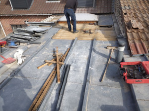 Photo de galerie - Toiture en zinc transformé en toit terrasse membrane PVC avec isolation 