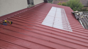 Photo de galerie - Réalisation d'une toiture en bac acier 