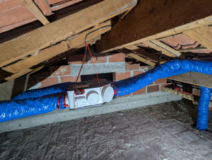 Photo de galerie - Installation d'une Vmc hygro ecowatt(conso réduite ) en gaine renforcée aluminium.