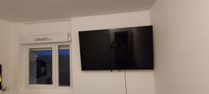 Photo de galerie - Fixation de télé au mur