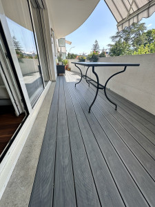 Photo de galerie - Réalisation du terrasse en bois stratifié 