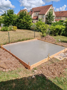 Photo de galerie - Création de dalle pour chalet en bois 
