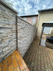 Photo de galerie - Pose pierre de Parment sur un muret