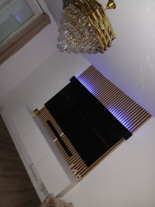 Photo de galerie - Pose meuble et panneaux en bois et tv