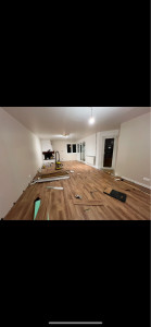 Photo de galerie - Pose de sous couche et parquet stratifié 