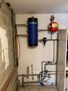 Photo de galerie - Remplacement d'une PAC pour plancher chauffant, reprise de plomberie