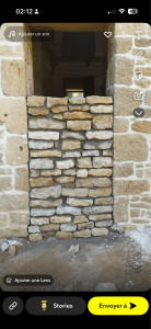Photo de galerie - Réalisation re bouchage d’une porte en pierre 