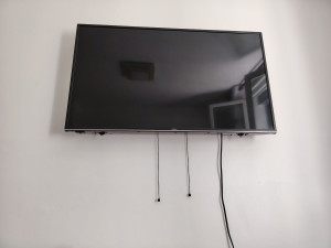 Photo de galerie - Accroche d'une tele  