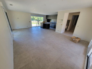 Photo de galerie - Réalisation sol salon, grès cérame 60x60