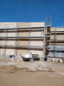 Photo de galerie - Enduit de façade frotassé avec machine de projection 