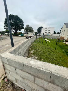 Photo de galerie - Montage d'un mur en parpaing 