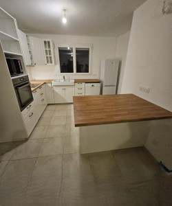 Photo de galerie - Cuisine IKEA avec un ilot centrale