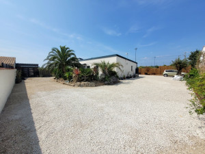 Photo de galerie - Création d'une zone de parking en cailloux calcaire blanc