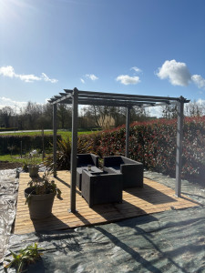 Photo de galerie - Réalisation d’une terrasse avec pergola