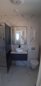 Photo de galerie - Création salle de bain complète. pose carrelage,plomberie, électricité, et accessoires 