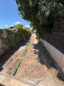 Photo de galerie - Passage de gaine sur une allée 