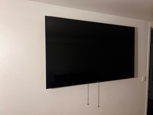 Photo de galerie - Pose support Tv murale 