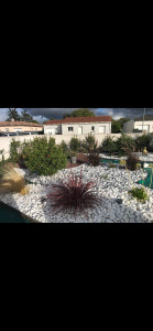 Photo de galerie - Réalisation de massif avec galet