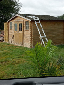 Photo de galerie - Dépose des plaques goudronnées et pose de tôles bac acier